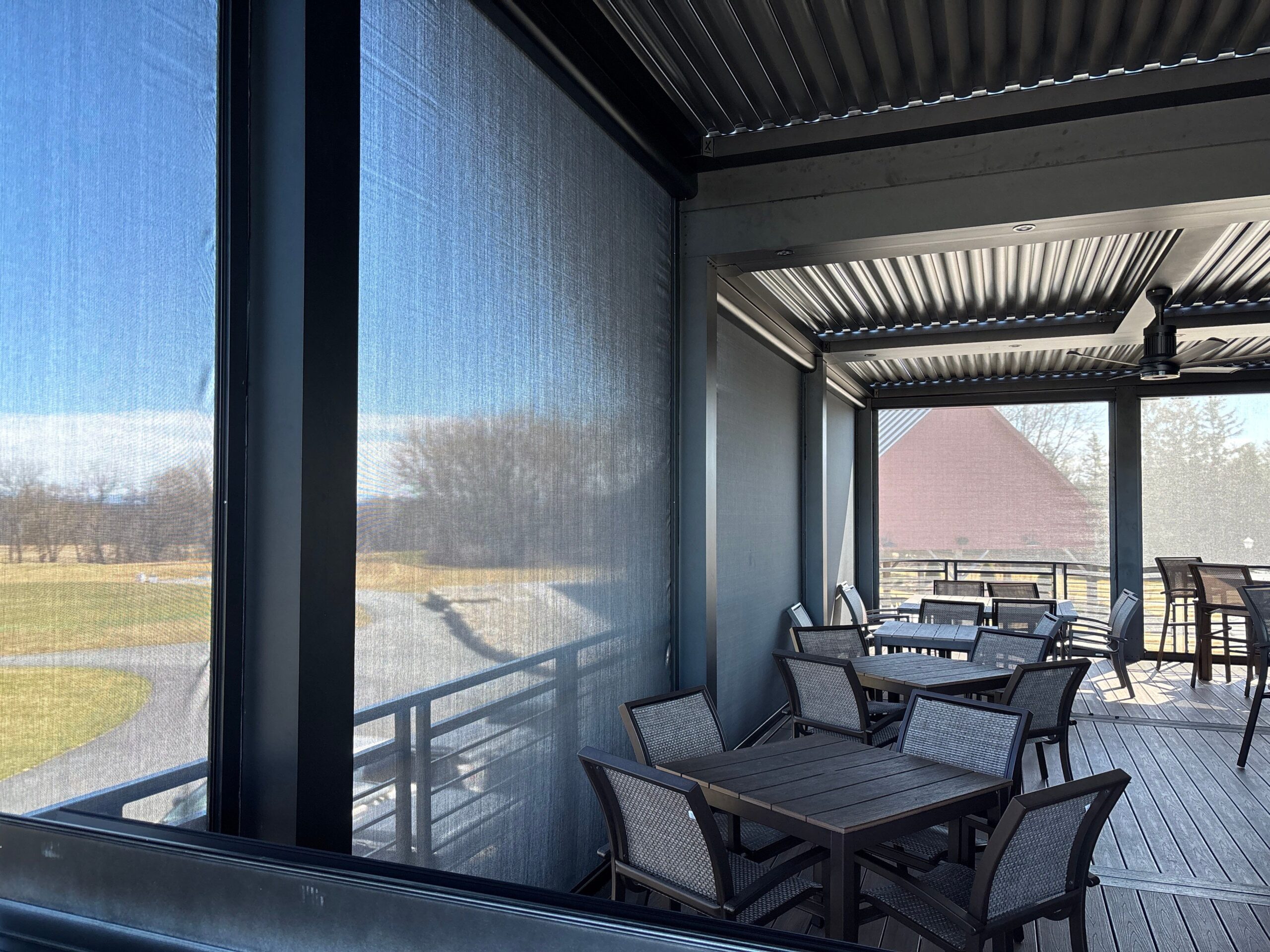 Retractable screens installed on pergola.